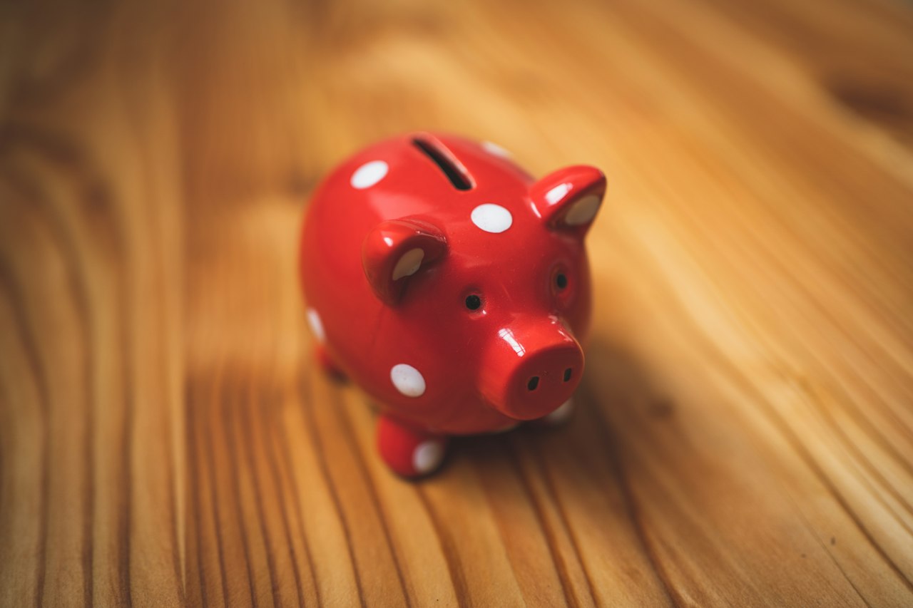 Piggy bank representing savings on health insurance premiums