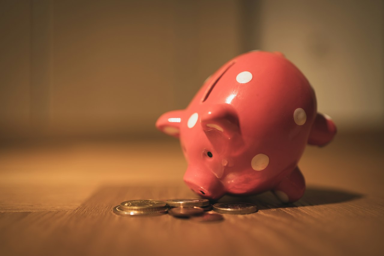 Piggy bank with coins representing HSA savings