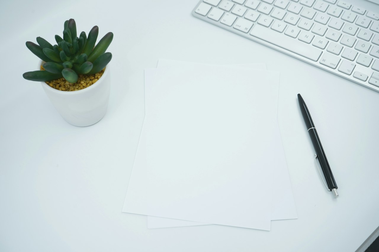 Papers and pen on a desk for writing an appeal letter