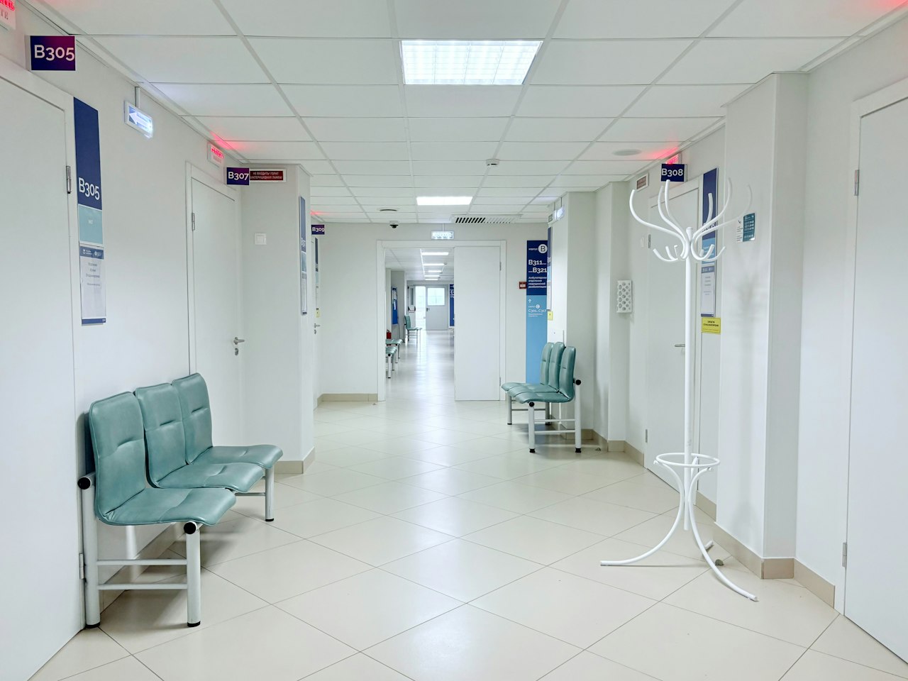 Bright hospital corridor representing health plan coverage levels